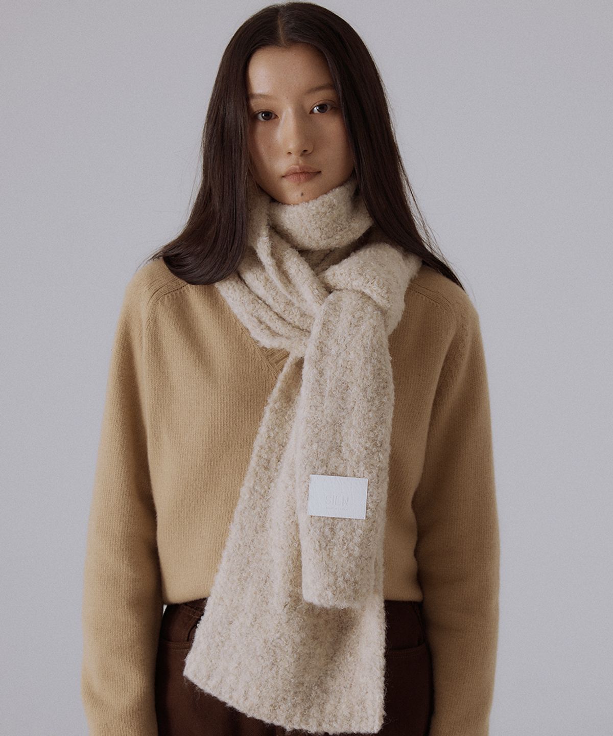 실른(SILN) Long cloud boucle knit muffler (OAT BEIGE)