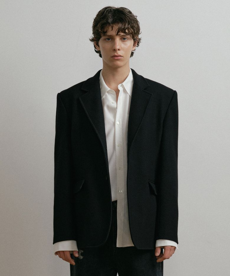 BLACK WOOL ZIP-SLEEVE TAILORED BLAZER