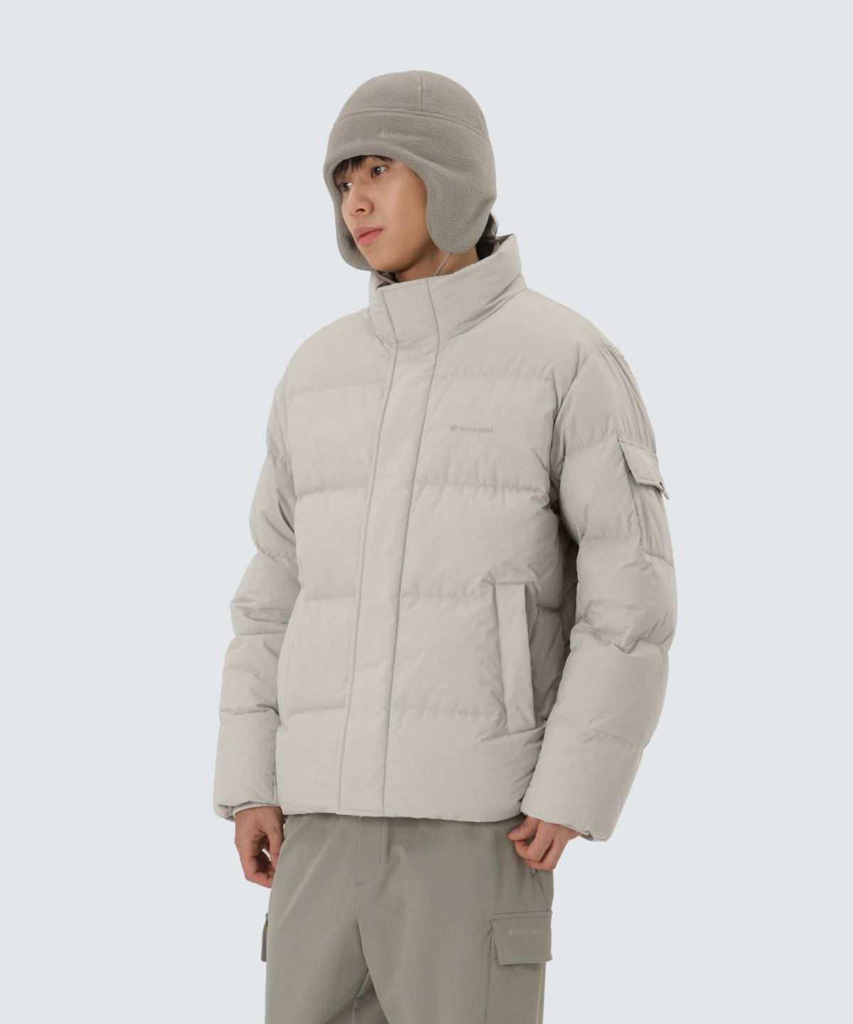 스노우피크 어패럴(SNOWPEAK APPAREL) 랜드에어 스탠드넥 헤비 다운 자켓 (S25WMGDJ42) Sand Beige