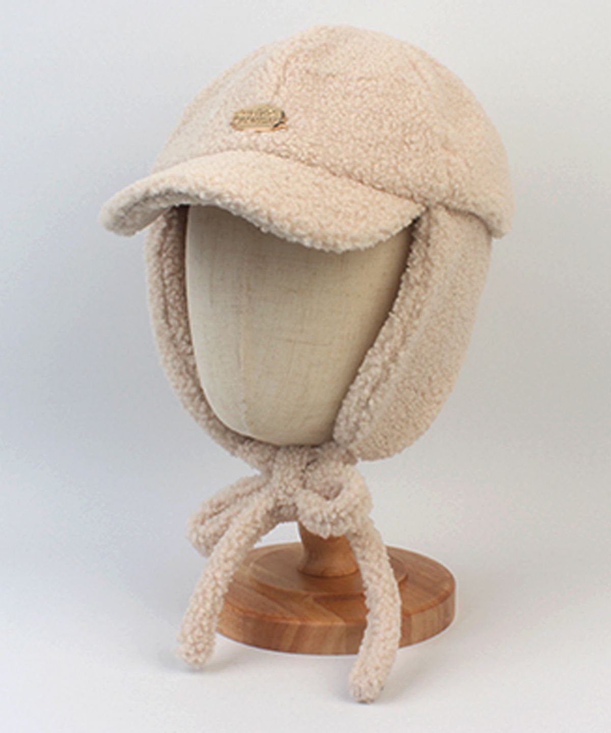 유니버셜 케미스트리(UNIVERSAL CHEMISTRY) Bubble Metal Beige Fleece Earflap Cap 귀달이모자