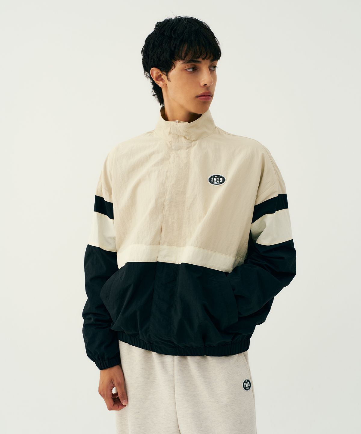 유씨엘에이(UCLA) 남녀공용 스포티브 배색 바람막이[BEIGE](UB9UJ20)