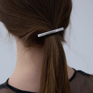 Metal logo hair band