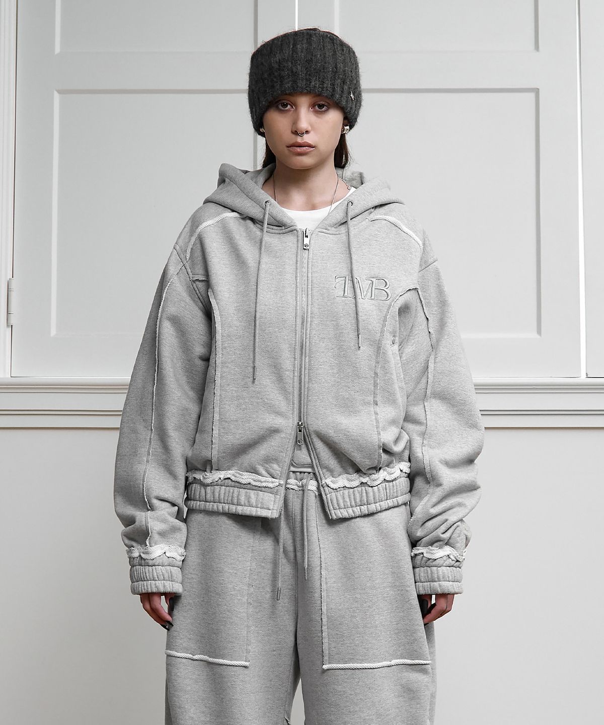 트리밍버드(TREEMINGBIRD) Cut-Out Set-up Sweat Jumper [ Melange Gray ]