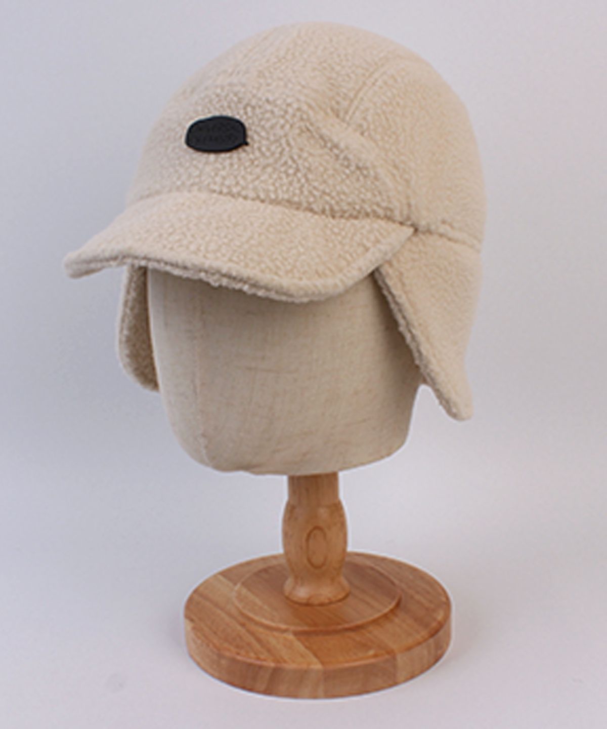 유니버셜 케미스트리(UNIVERSAL CHEMISTRY) Fleece Beige Half Earflap Cap  귀달이모자