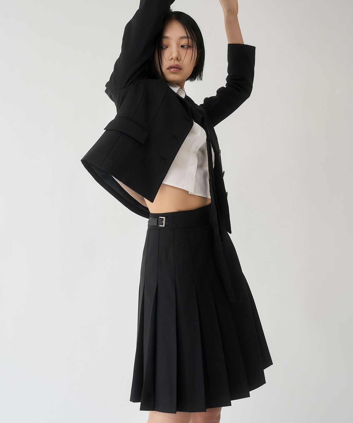 유심(YOUSHIM) 플리츠 울 킬트 스커트