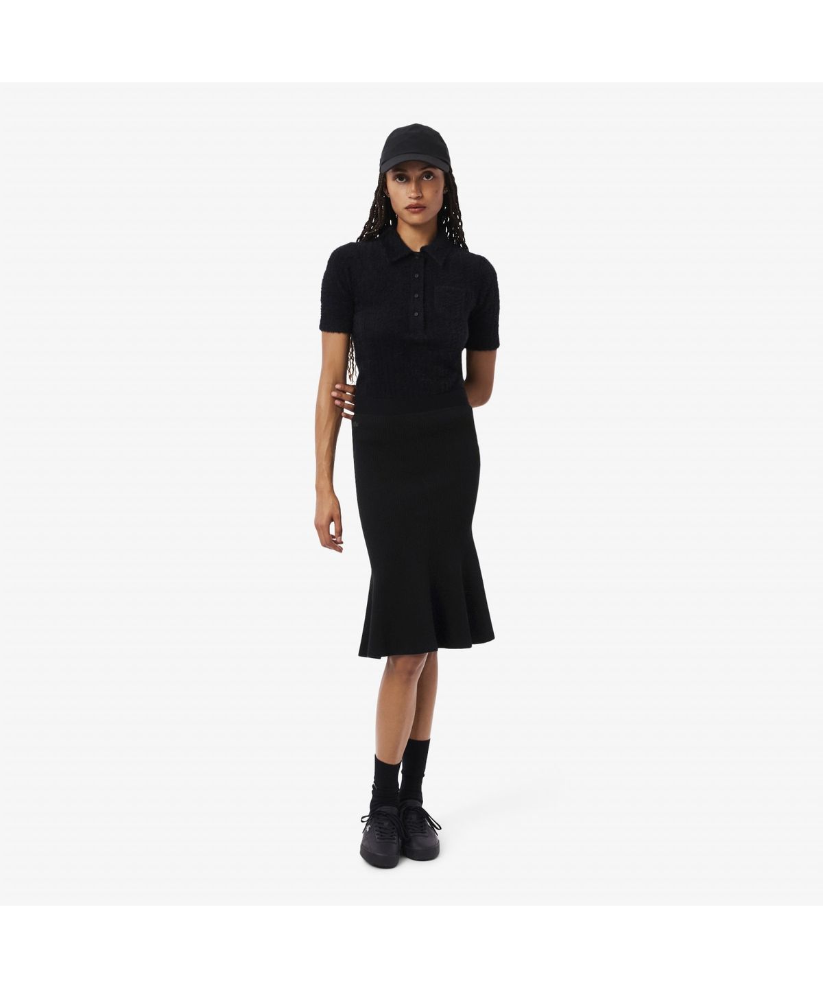 라코스테(LACOSTE) 여성 3D 립조직 플레어 미디스커트 JF4162-55N 031