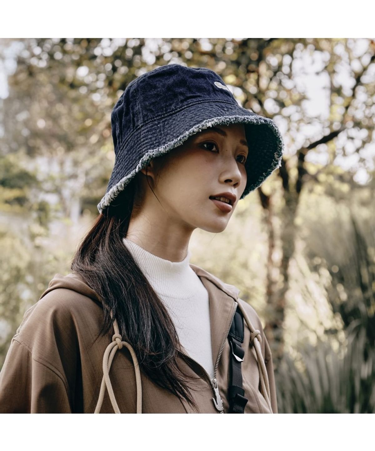 라코스테(LACOSTE) 여성 코튼 빈티지 컷팅 버킷햇 RK414E-55N RNE