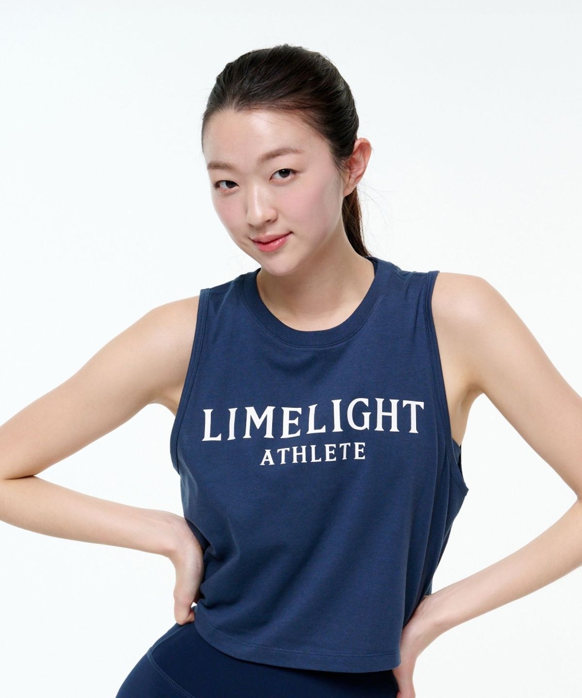 라임라잇 어패럴(LIMELIGHT APPAREL) 애슬릿 우먼즈 크롭 슬리브리스 (네이비/화이트)