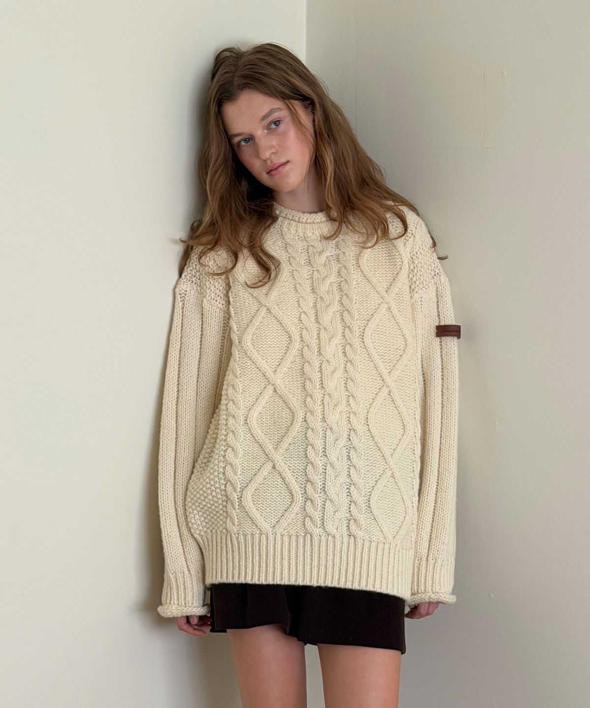 썸웨어버터(SOMEWHEREBUTTER) Bens Cable Wool Knit - Cream