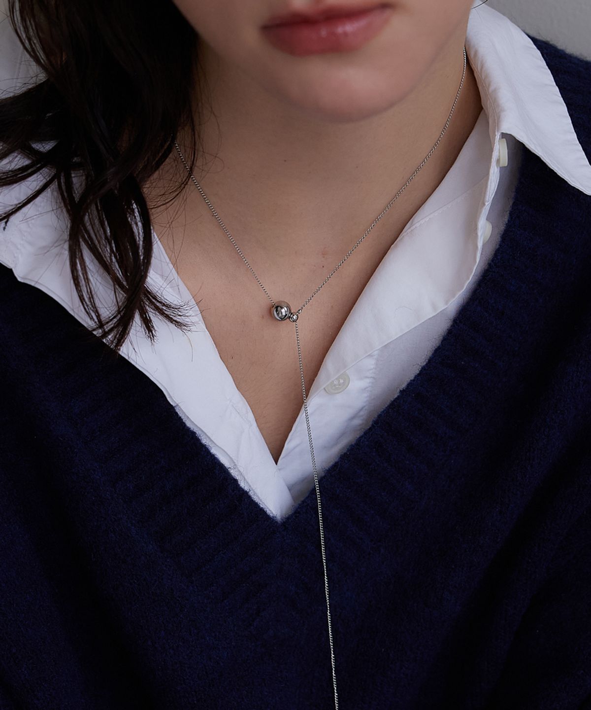메리모티브(MERRYMOTIVE) Ball and Pearl long chain necklace