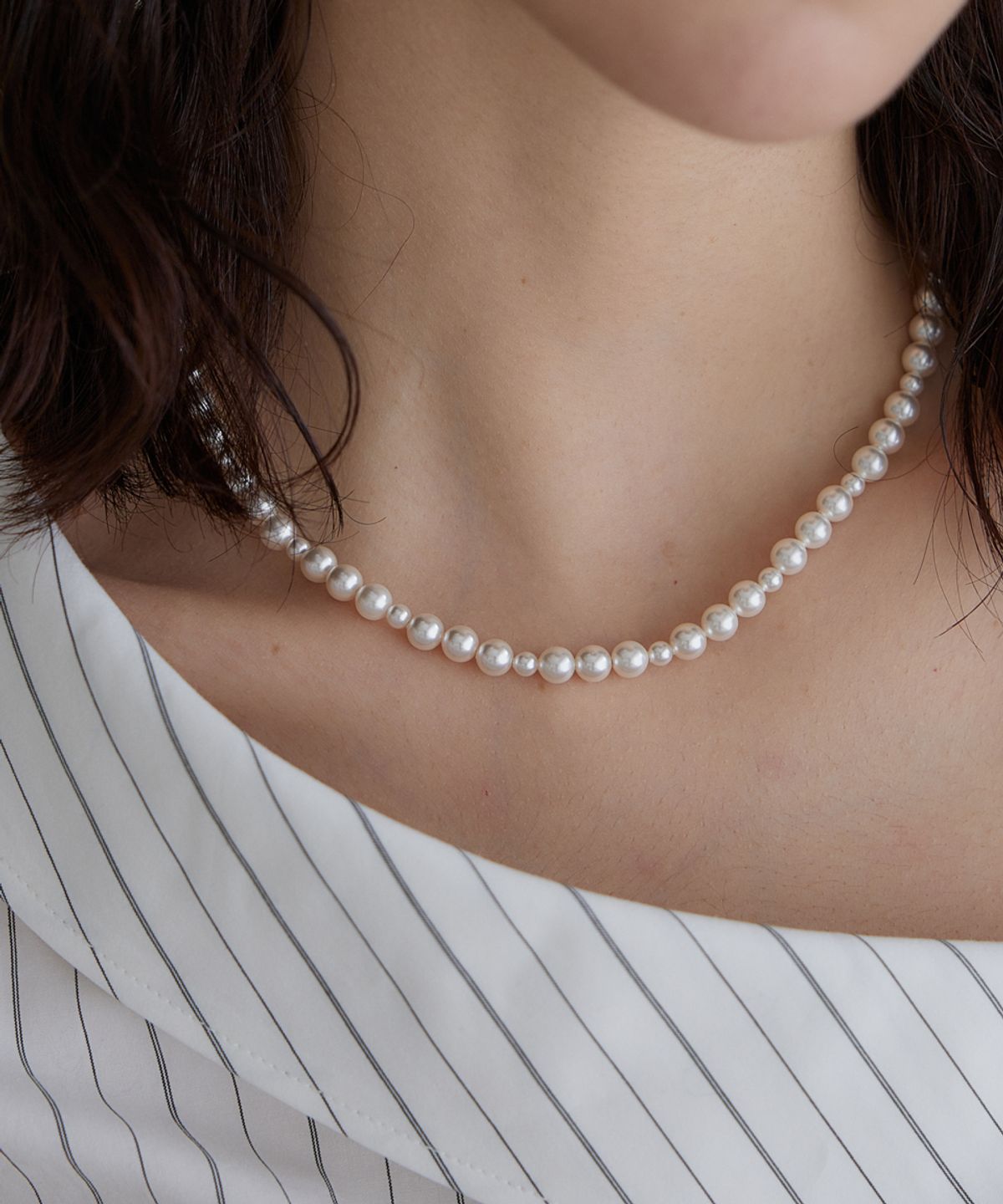 메리모티브(MERRYMOTIVE) White pearl rhythmical necklace