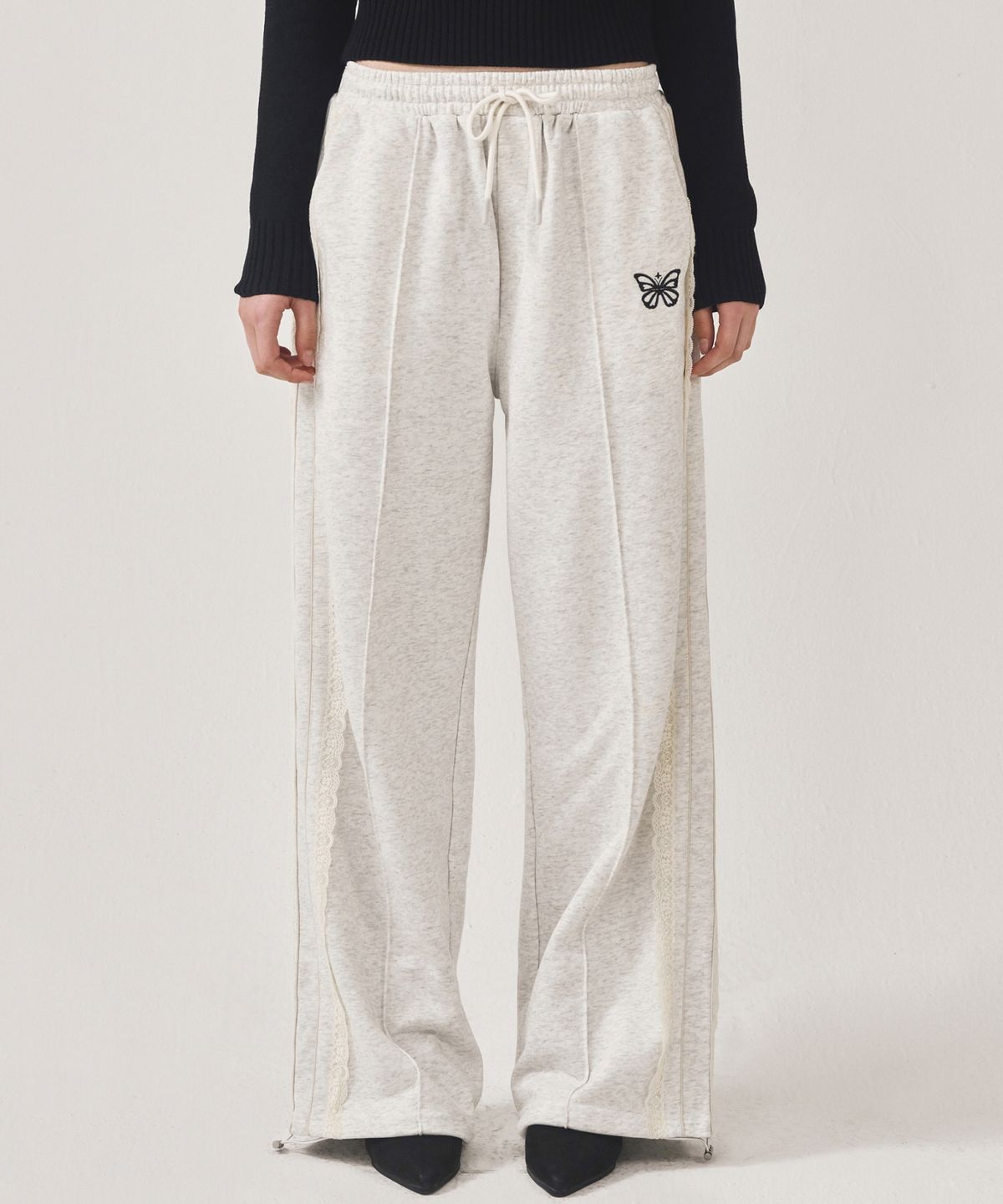 닉앤니콜(NICK&NICOLE) BUTTERFLY LACE SWEAT PANTS_MELANGE