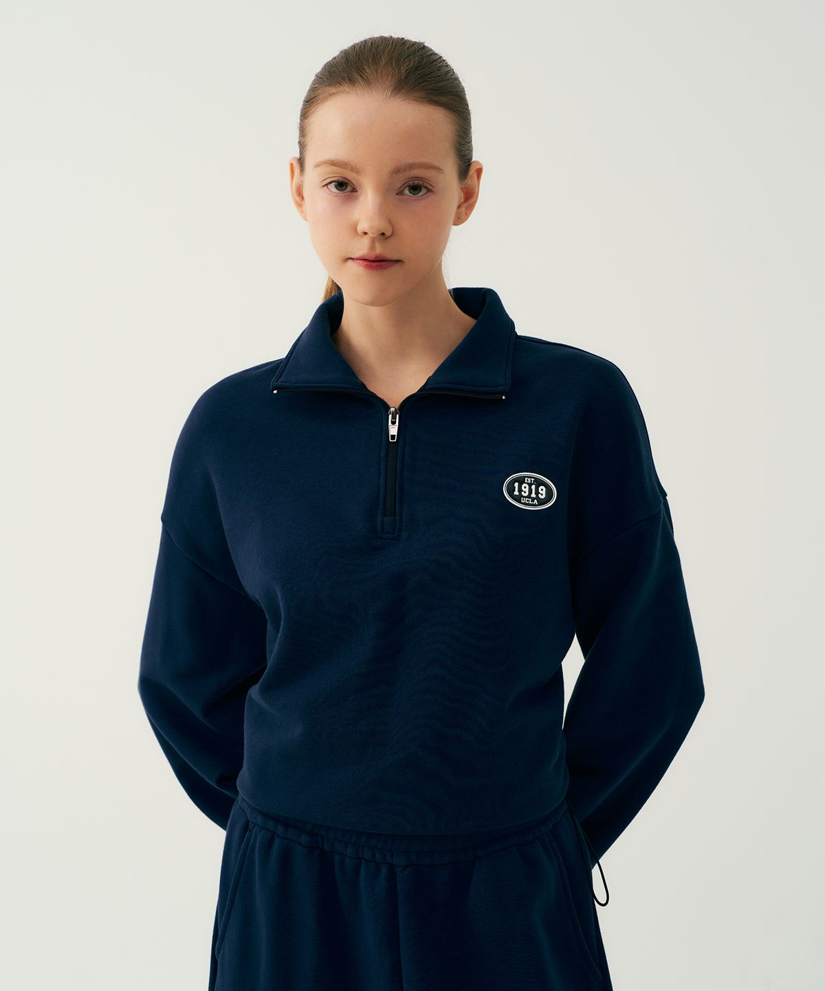 유씨엘에이(UCLA) 여성 스포츠 1919 UCLA 하프집업[NAVY](UB9LT61)