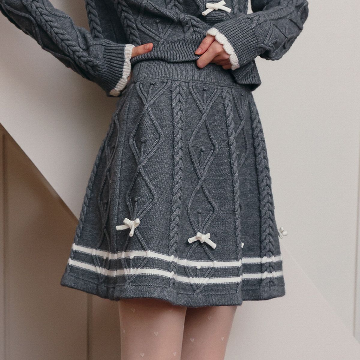 쎄무아듀(CEST MOIDEW) Cest_Bow cable knit skirt