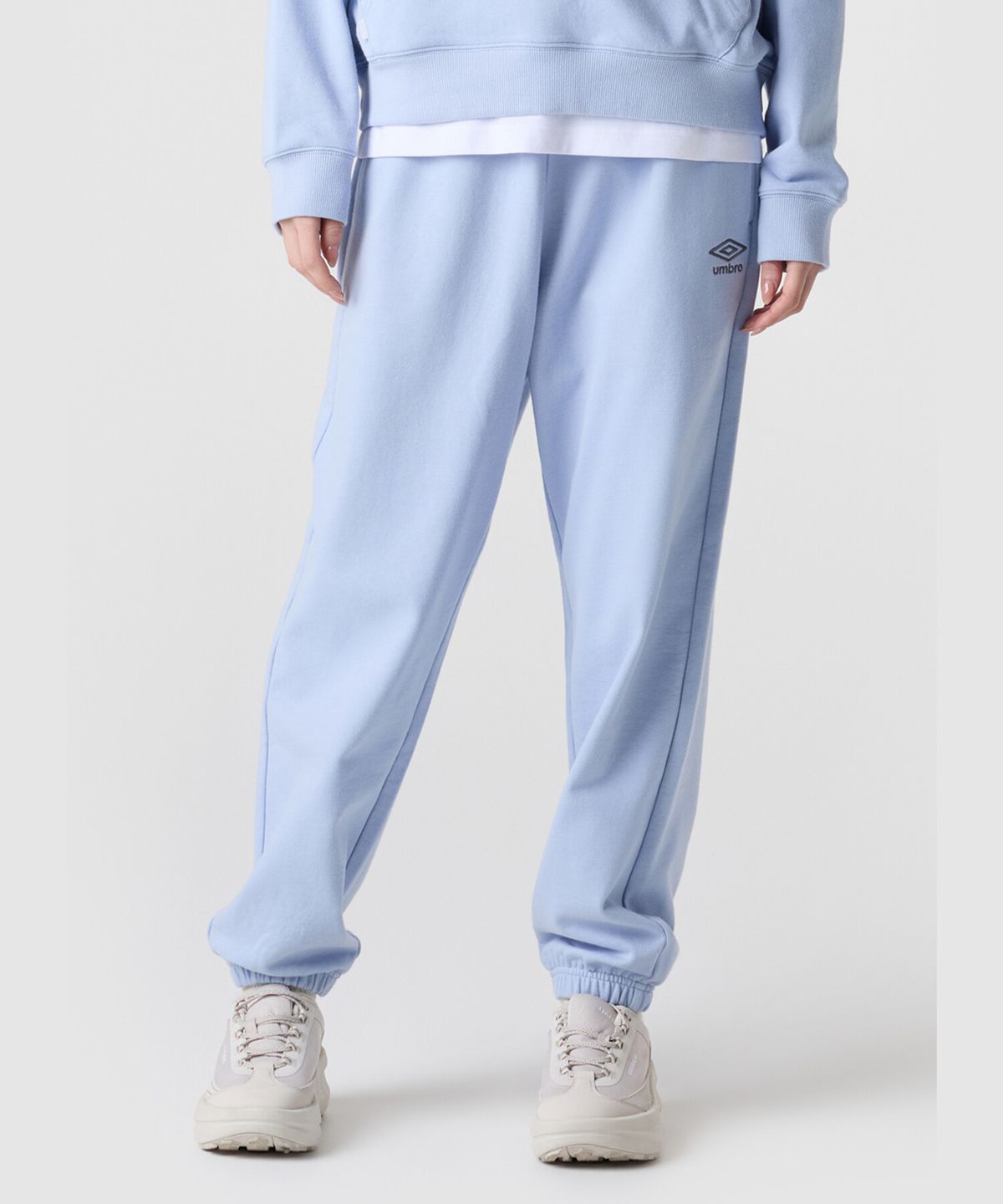 엄브로(UMBRO) 에센셜 루즈 조거 팬츠 스카이블루 UR123CFP19