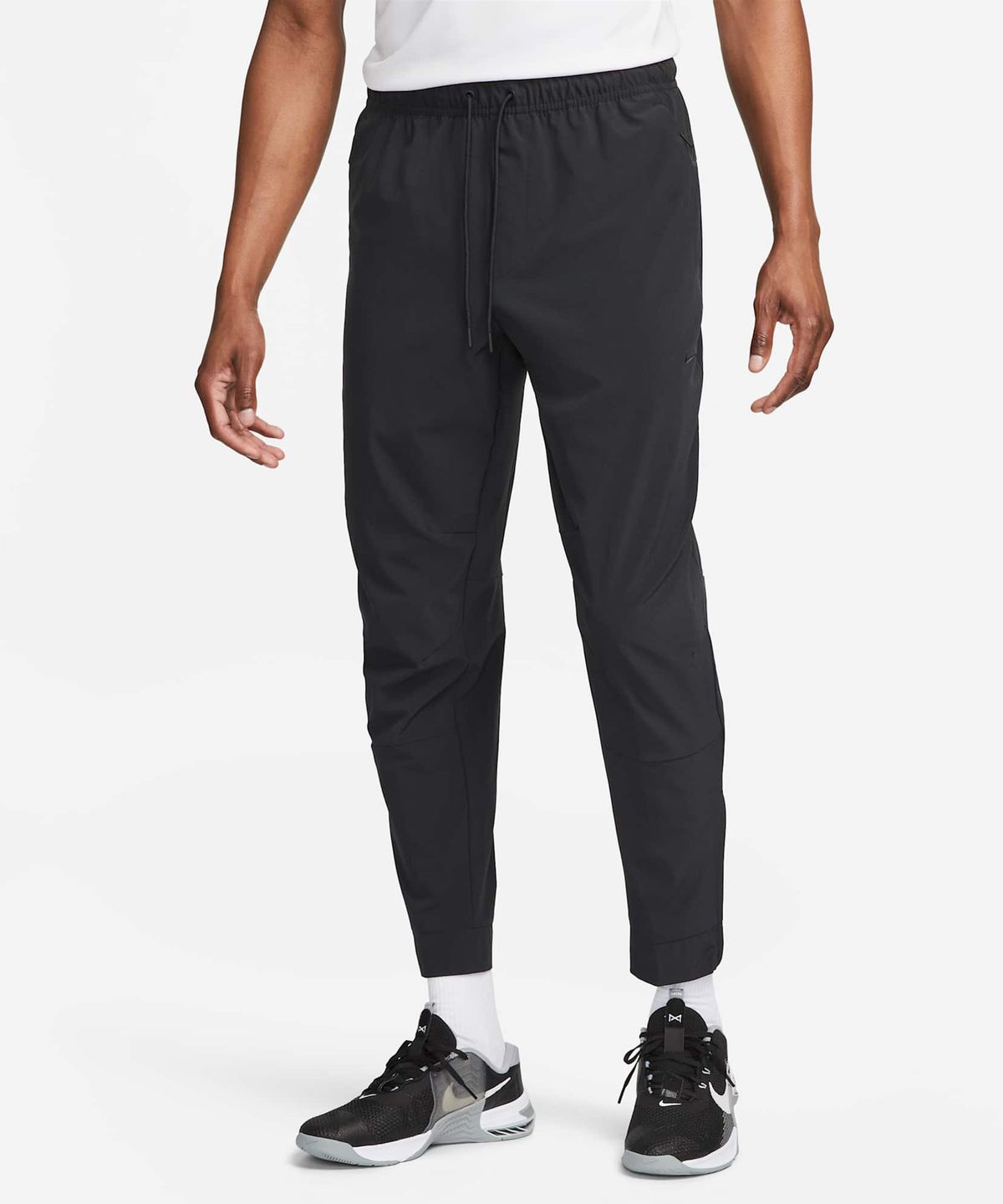 나이키(NIKE) 드라이 핏 언리미티드 테이퍼드 레그 다용도 팬츠 M - 블랙 / FB7549-010
