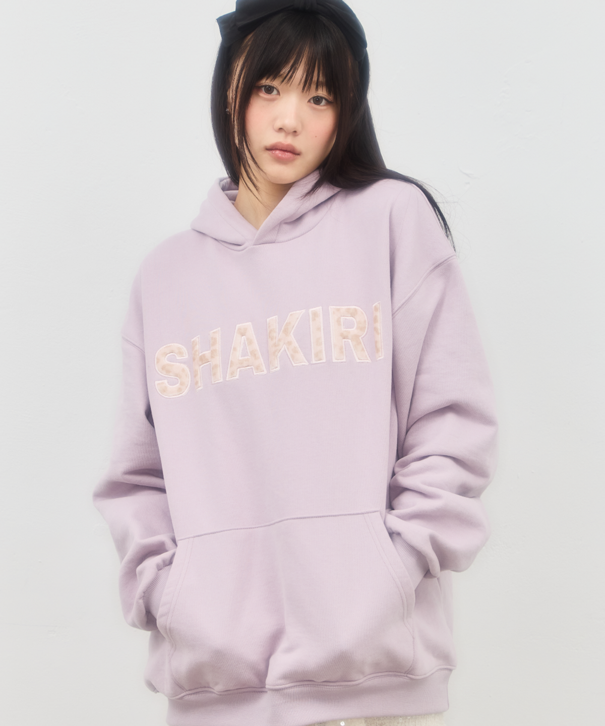 샤키리(SHAKIRI) 레오 샤키리 로고 후디 (라일락)