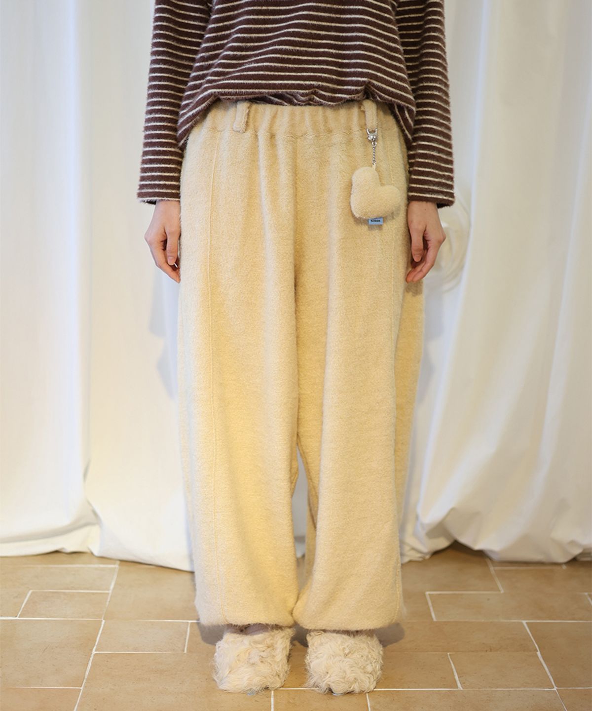 소르디(SORDI) Keyring Jogger Pants_butter