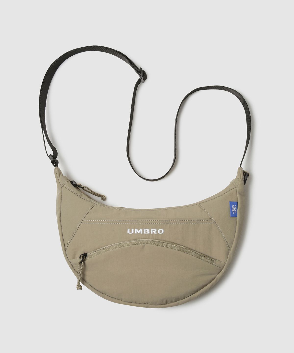 엄브로(UMBRO) 에센셜 포켓 호보백 베이지 UR123CBG11