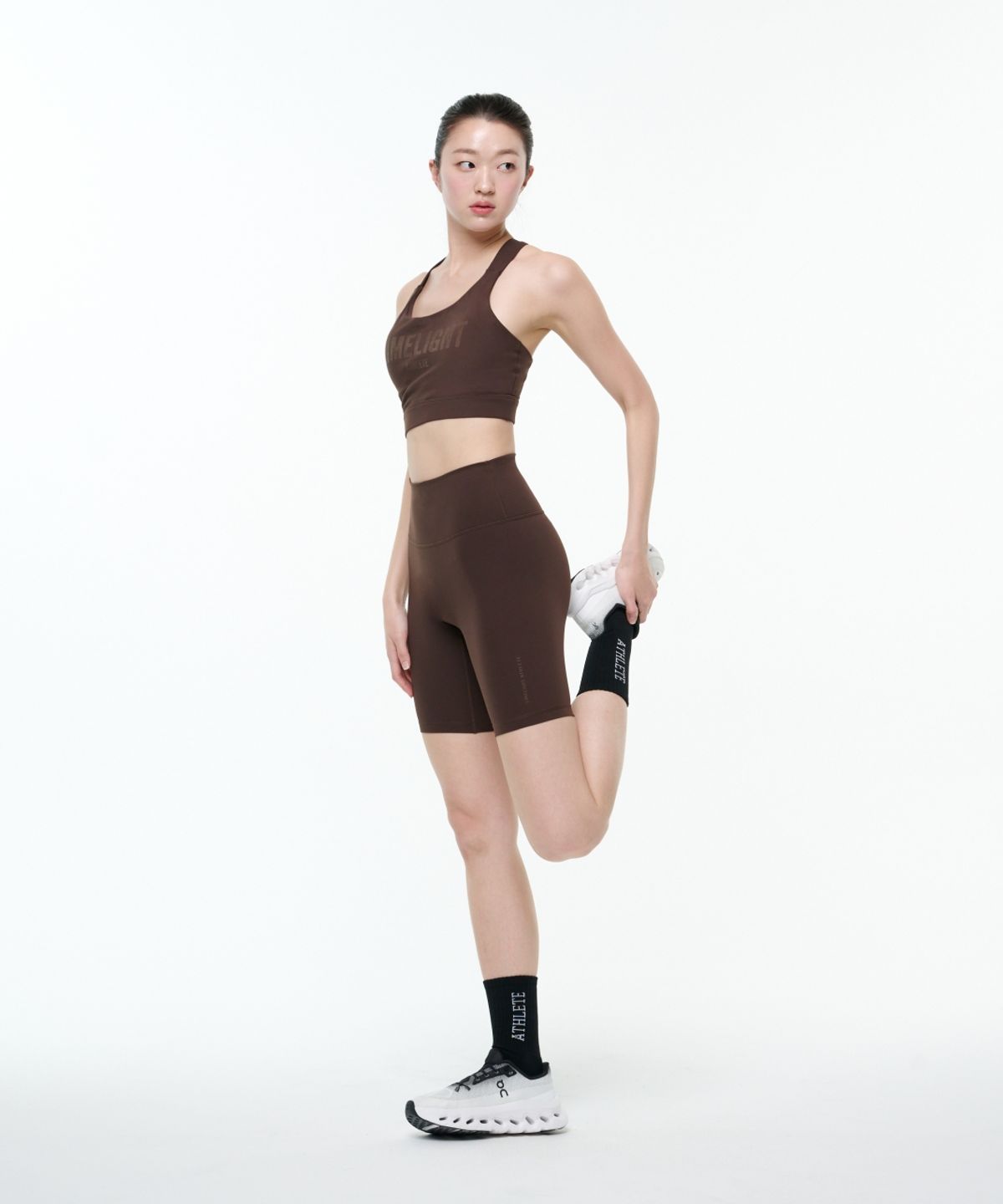 라임라잇 어패럴(LIMELIGHT APPAREL) 애슬릿 로고 레깅스 쇼츠 (브라운)