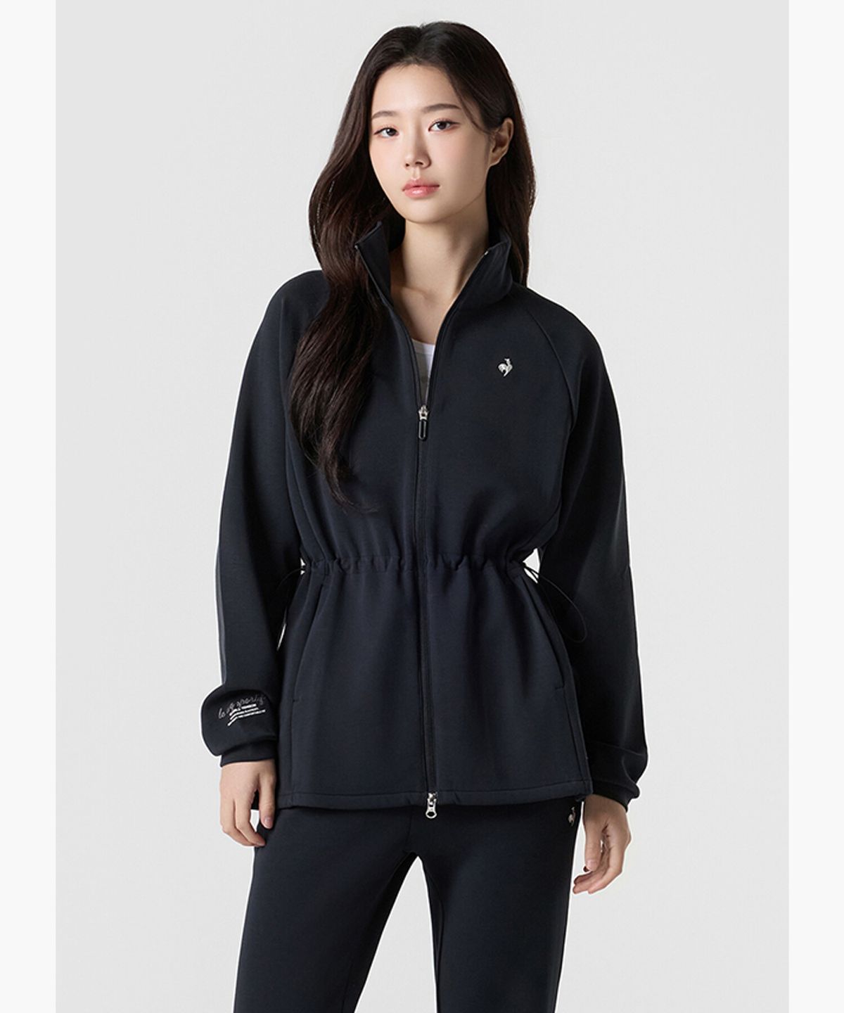 르꼬끄(LECOQ) 여성 더블텐션2.0 루즈핏 힙커버 자켓 - 블랙 QR122OFT12