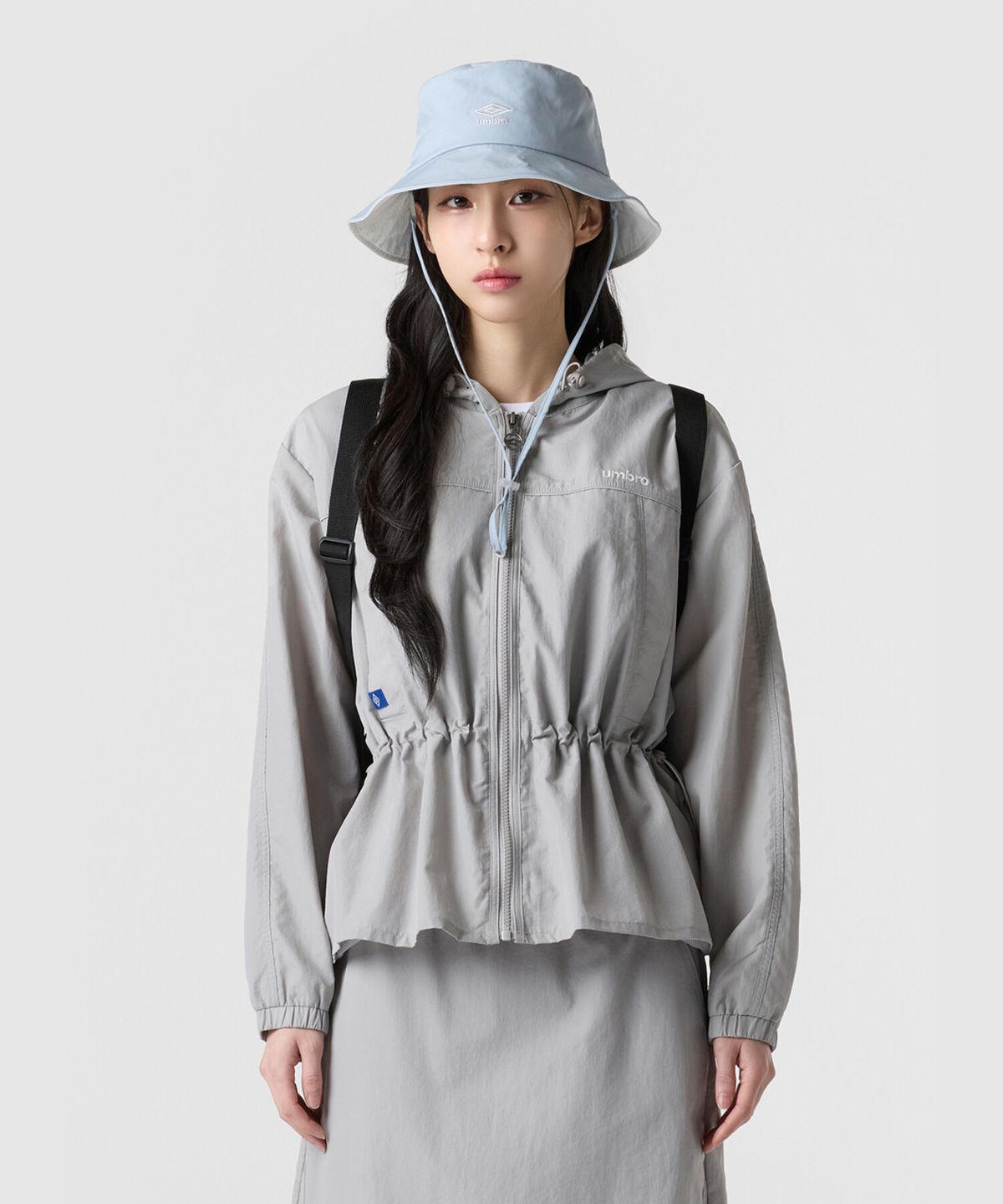 엄브로(UMBRO) 우먼스 트랙 후드 바람막이 자켓 베이지 UR122CJK12