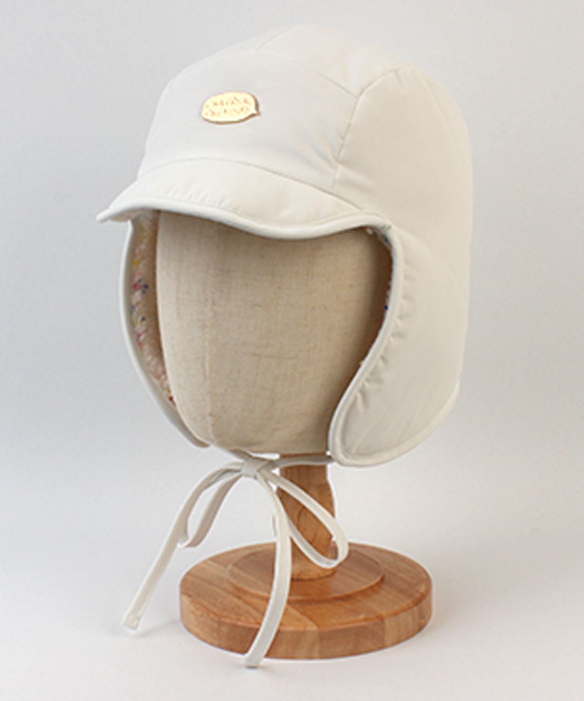 유니버셜 케미스트리(UNIVERSAL CHEMISTRY) Retro Poly Ivory Earflap Cap 귀달이모자