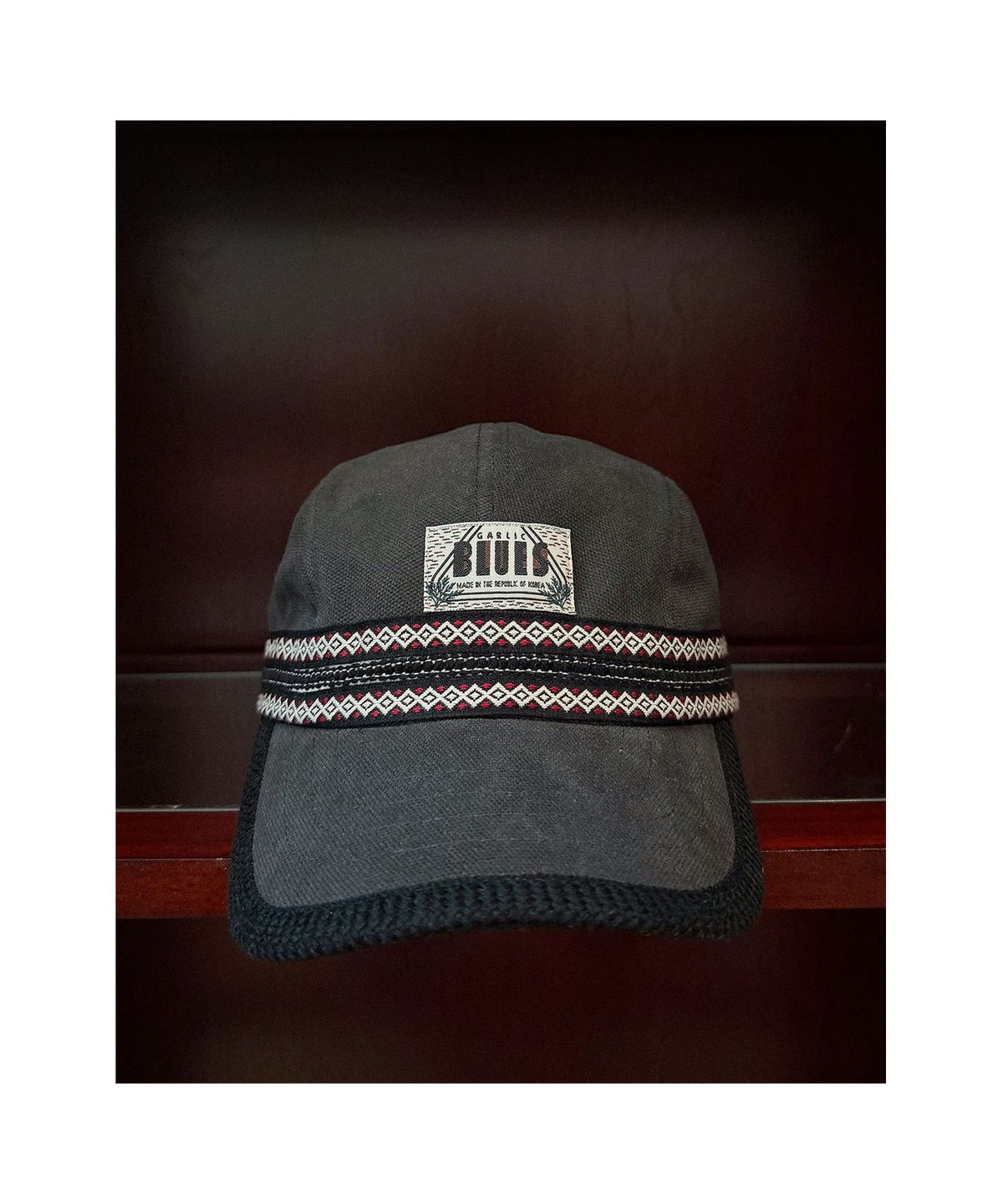갈릭 블루스(GARLICBLUES) TRIBAL JACQUARD CAMP CAP (Charcoal & Ladybug)