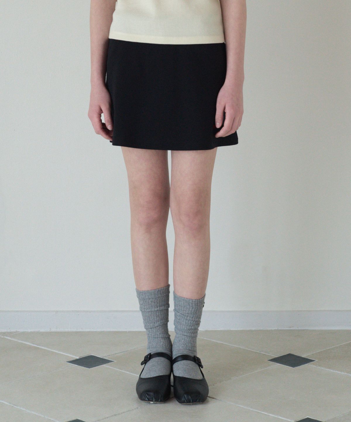 튜드먼트(TTUDEMENT) 50s EMBROIDERED MINI PANTSKIRT_BLACK