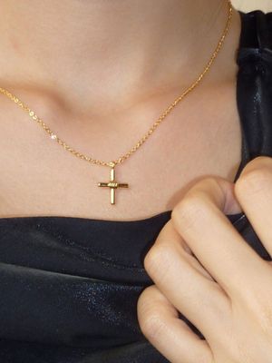 Tied cross necklace