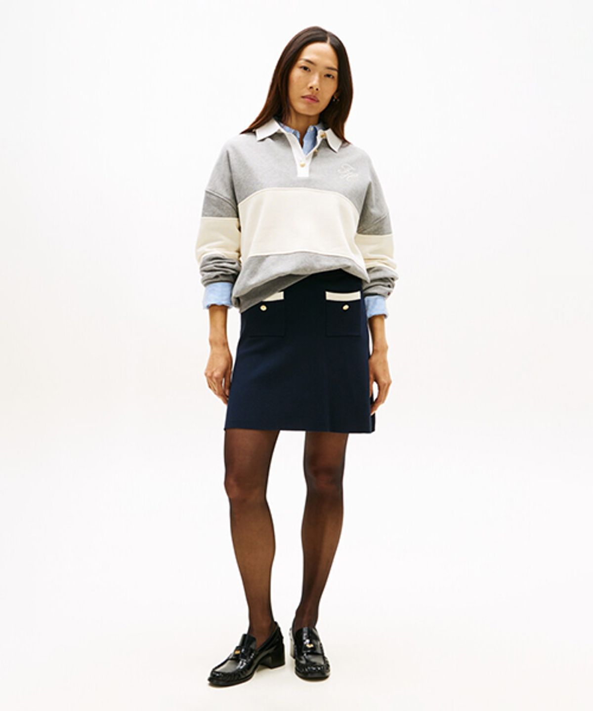 타미힐피거(TOMMY HILFIGER) 골드 버튼 포켓 스커트 (T22G0WSC041WT1DW5)