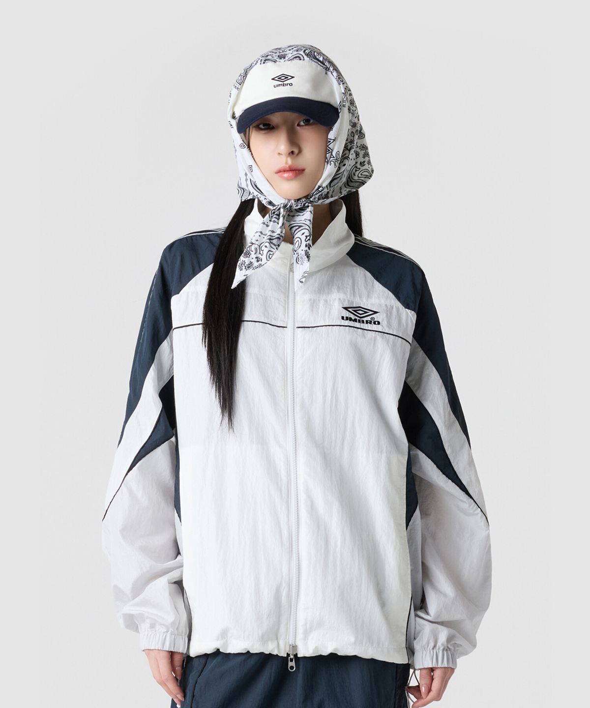 엄브로(UMBRO) HBL OG 스탠넥 바람막이 자켓 아이보리 UR121CJK23