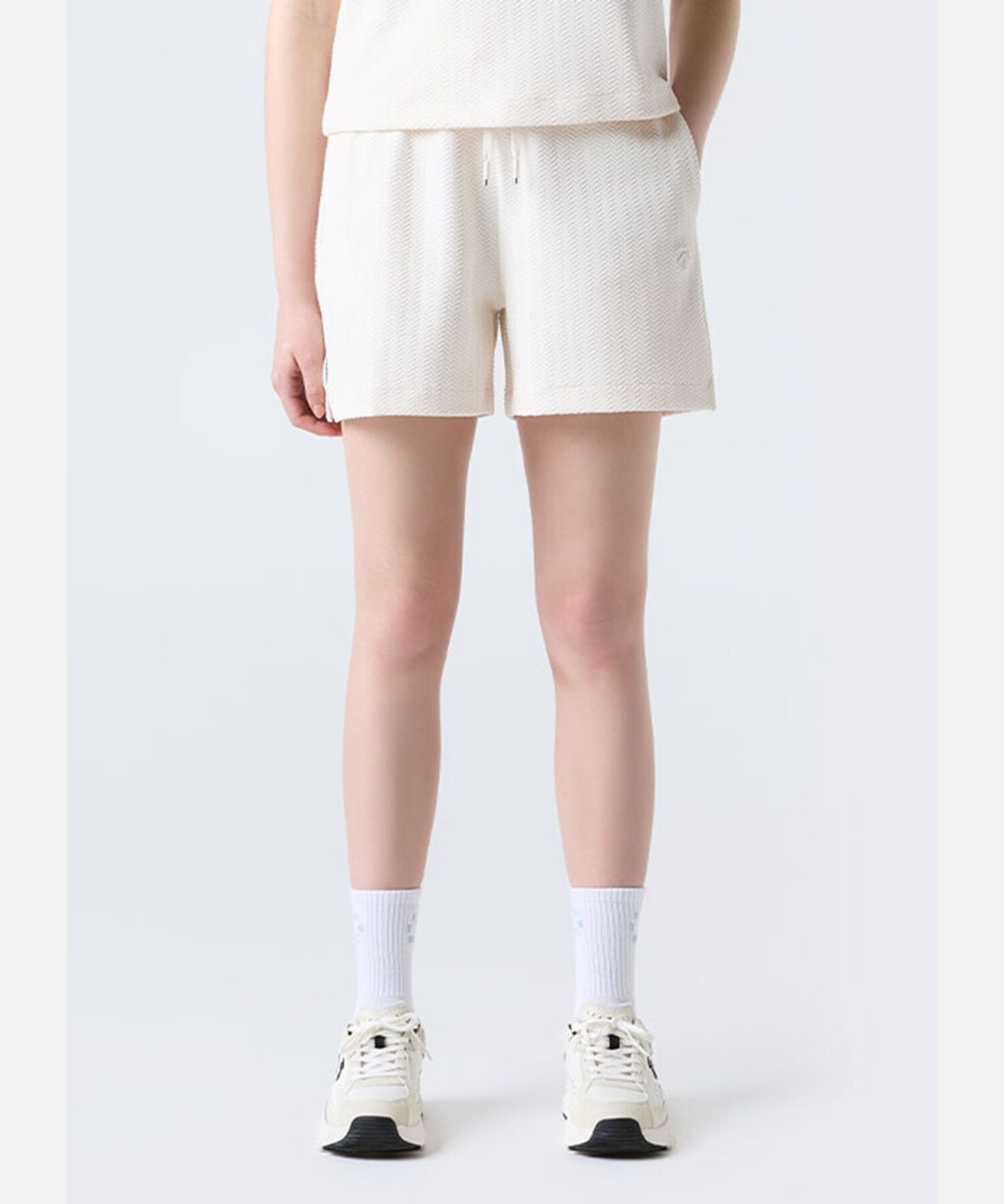 데상트(DESCENTE) 우먼스 4.5인치 자카드 니트 쇼츠 크림 SR122PKH21