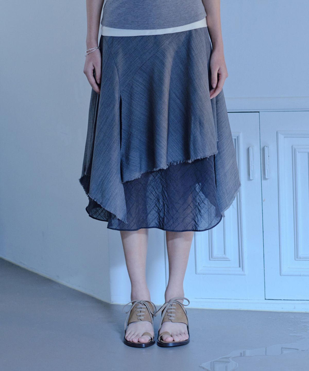 베르소(VERSO) Handed Fringed Skirt