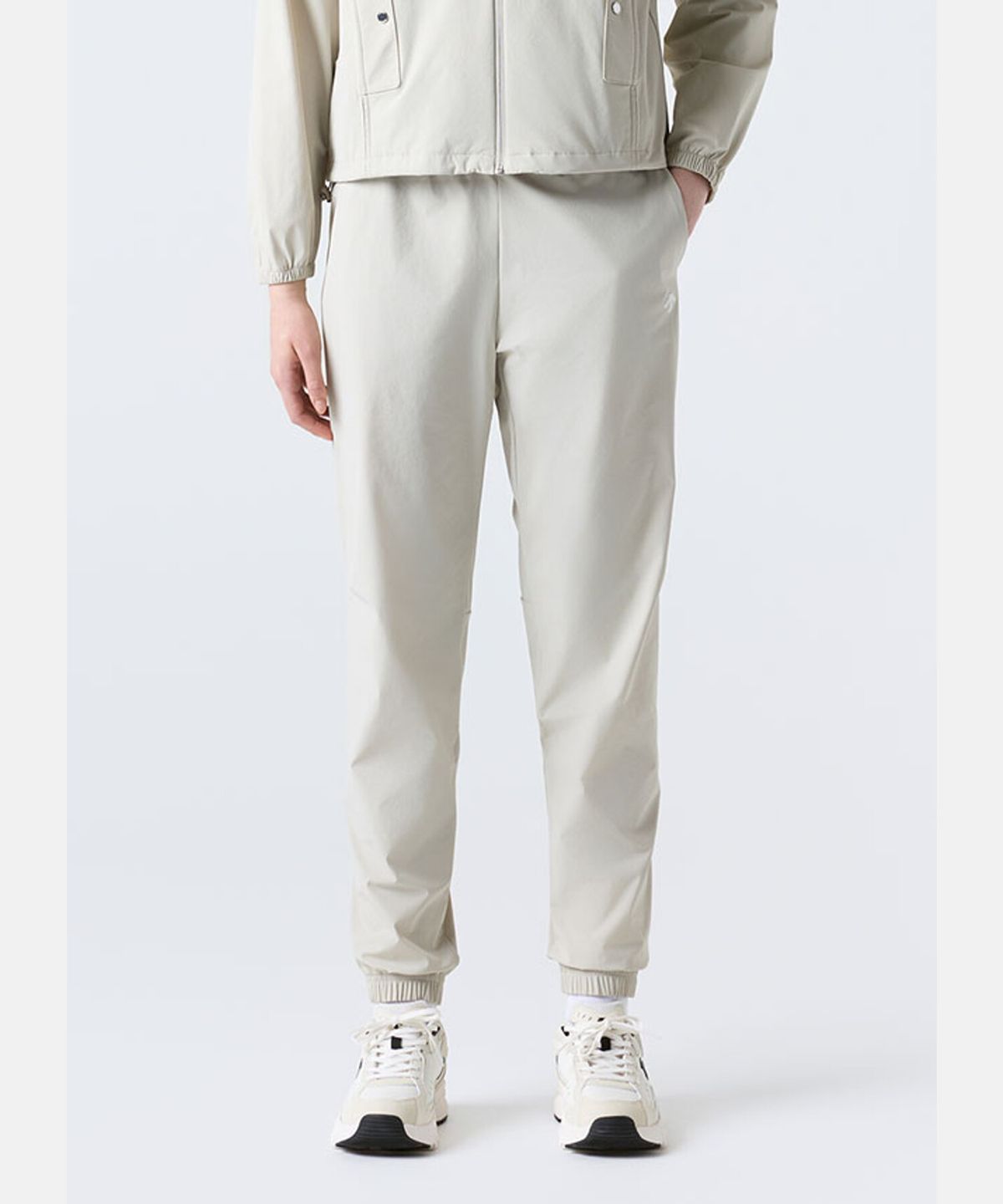 데상트(DESCENTE) 우먼스 조거 우븐 팬츠 베이지 SR122PWP11
