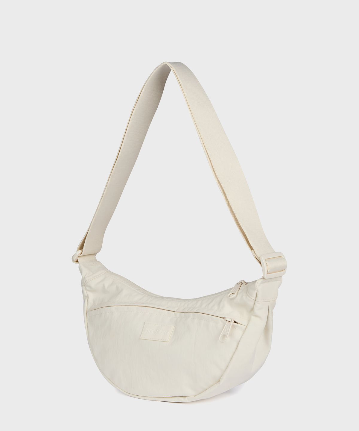 잔스포츠(JANSPORT) 언페이즈드 크로스바디 스몰 SOFT NYLON MOON FLOWER