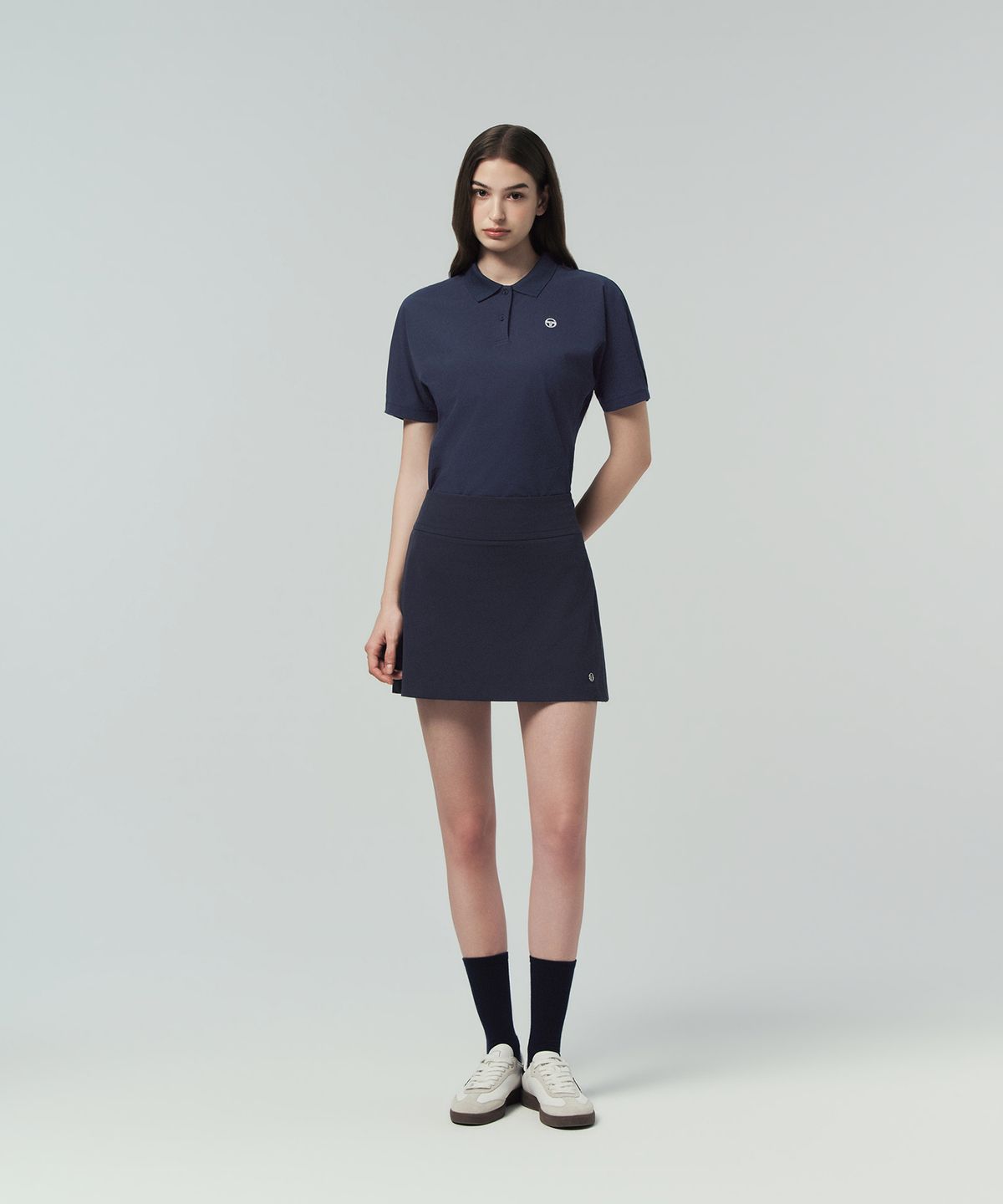 세르지오 타키니(SERGIO TACCHINI) W 타키니 플라잉 백플리츠 스커트 (Navy)
