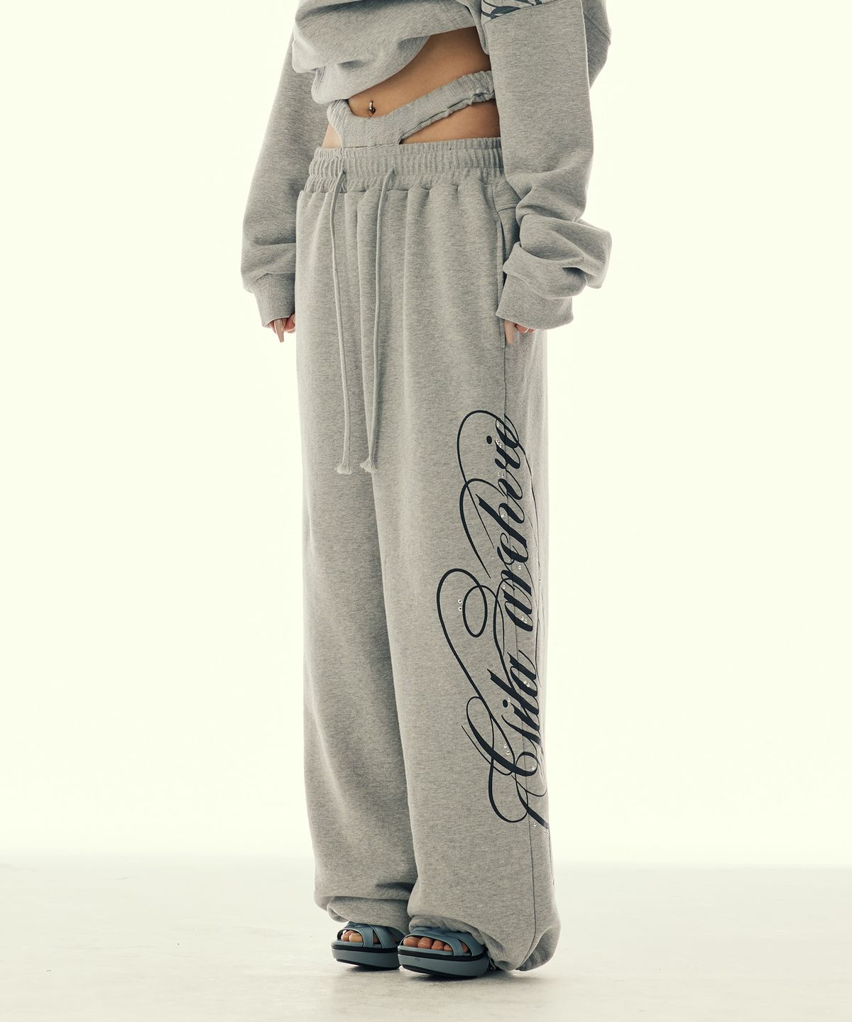 길라아카이브(GILAARCHIVE) CUT-OUT DOUBLE WAIST SWEAT PANTS_GREY