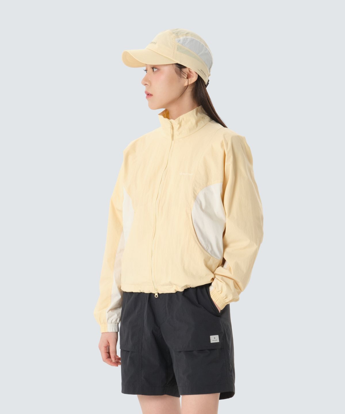 스노우피크 어패럴(SNOWPEAK APPAREL) 경량 타슬란 컬러블럭 여성 스탠드넥 바람막이 (S26SWLWB59) Light Yellow