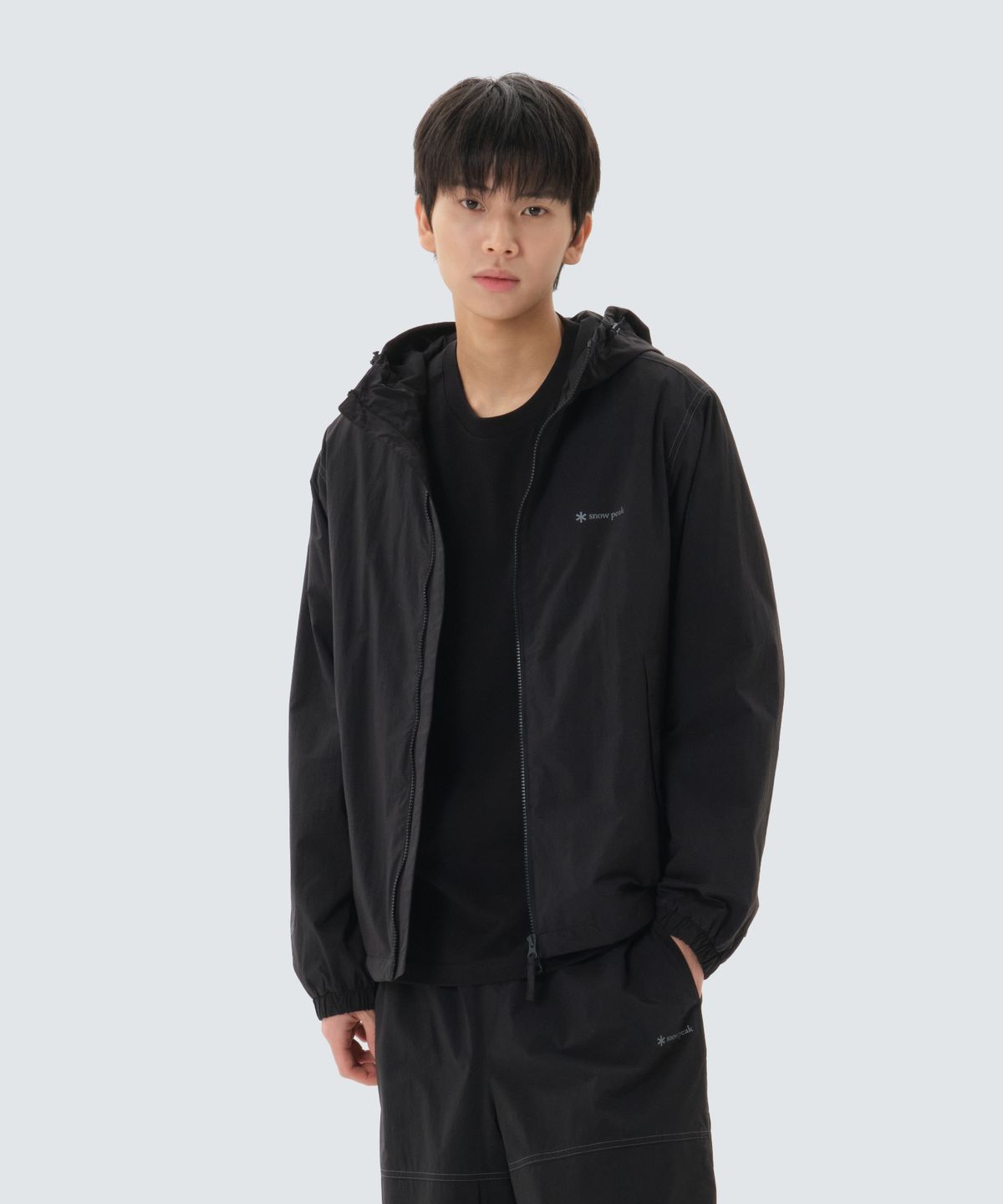 스노우피크 어패럴(SNOWPEAK APPAREL) 경량 타슬란 윈드스토퍼 후드 바람막이 (S26SMPJK02) Black