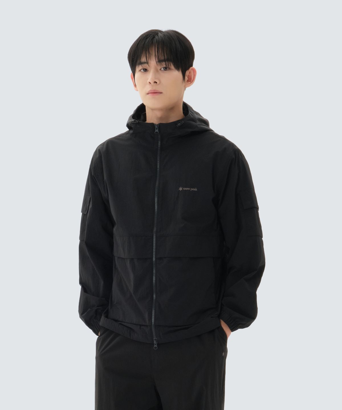 스노우피크 어패럴(SNOWPEAK APPAREL) 타슬란 포켓 바람막이 (S26MMLWB50) Black