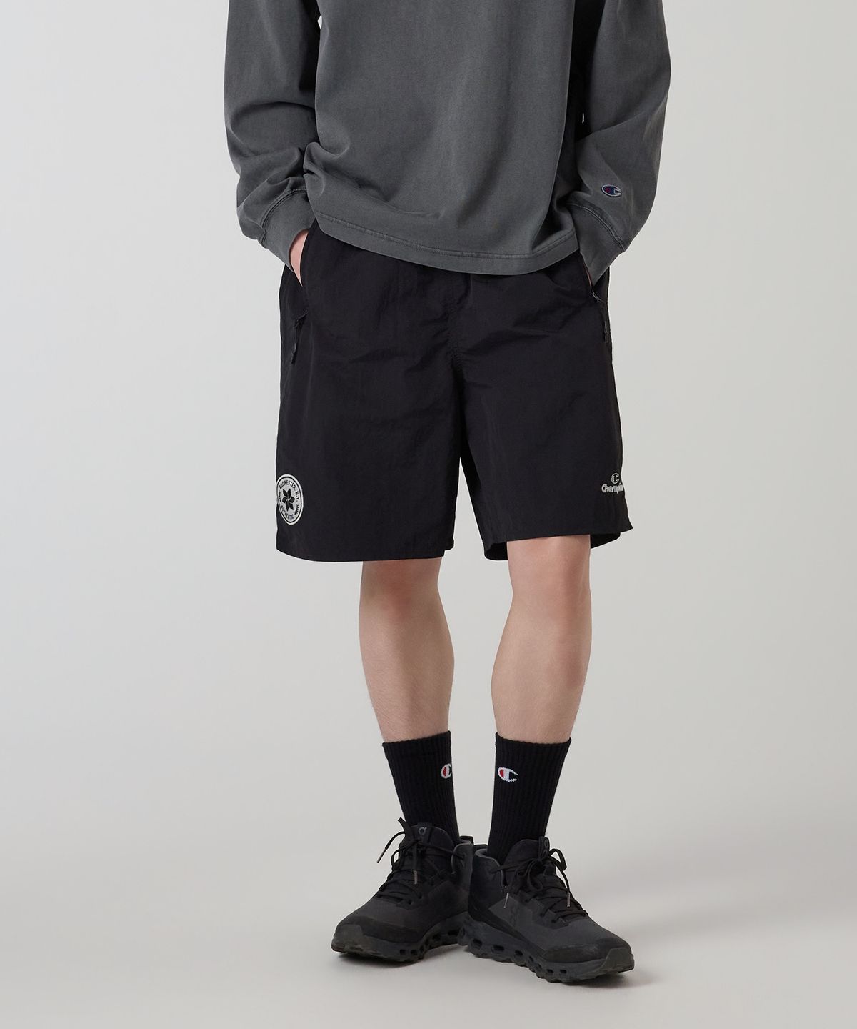 챔피온(CHAMPION) 트랙 로고 프로 쇼츠 Black