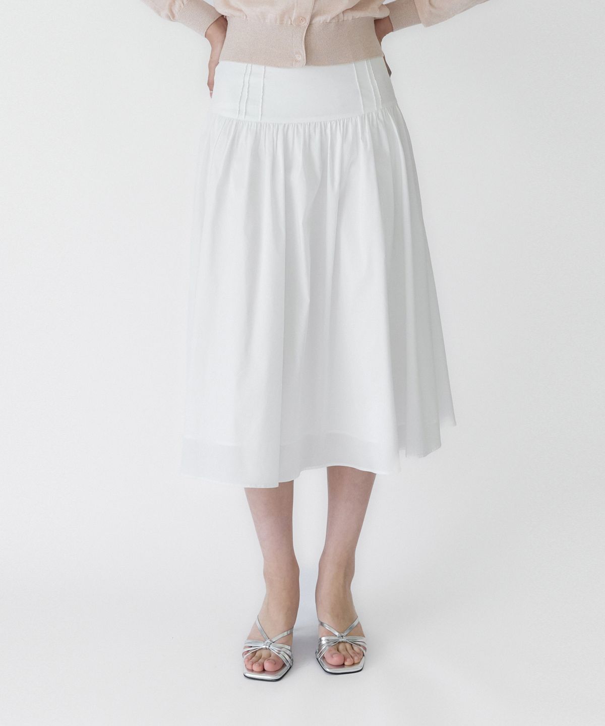 이보크에라(EVOKEERA) Anne Pintuck Wide Waist Flare Skirt(White)