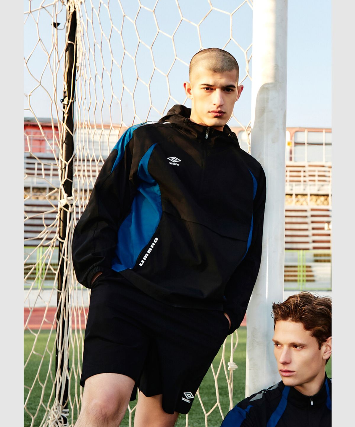 엄브로(UMBRO) PTR 우븐 워밍업 후드 아노락 블랙 UR121SWT38