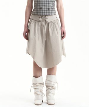EYELET UNBALANCED CUTTING SKIRT BEIGE