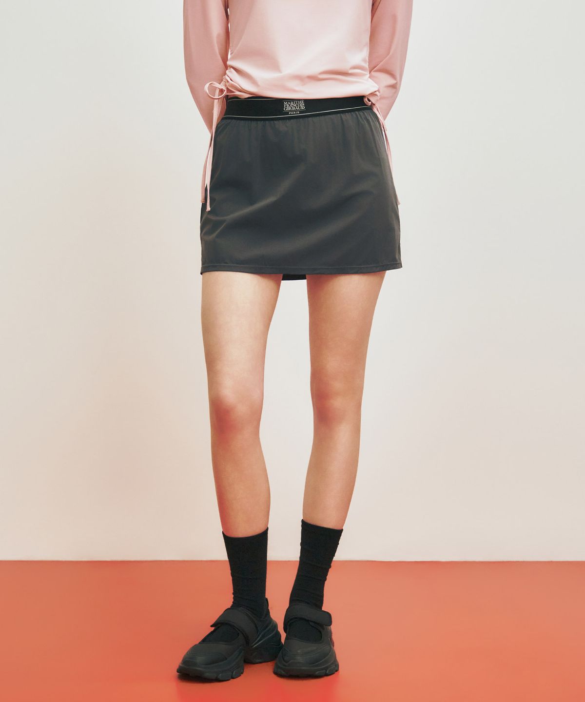 마리떼 스포츠(MARITHÉ SPORT) MARITHE SPORT FLARE MINI SKIRT charcoal