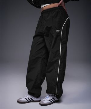 W PIPING LINE WIND SHELL PANTS [BLACK]