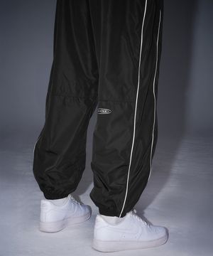WOVEN PIPING TRACK PANTS [BLACK]