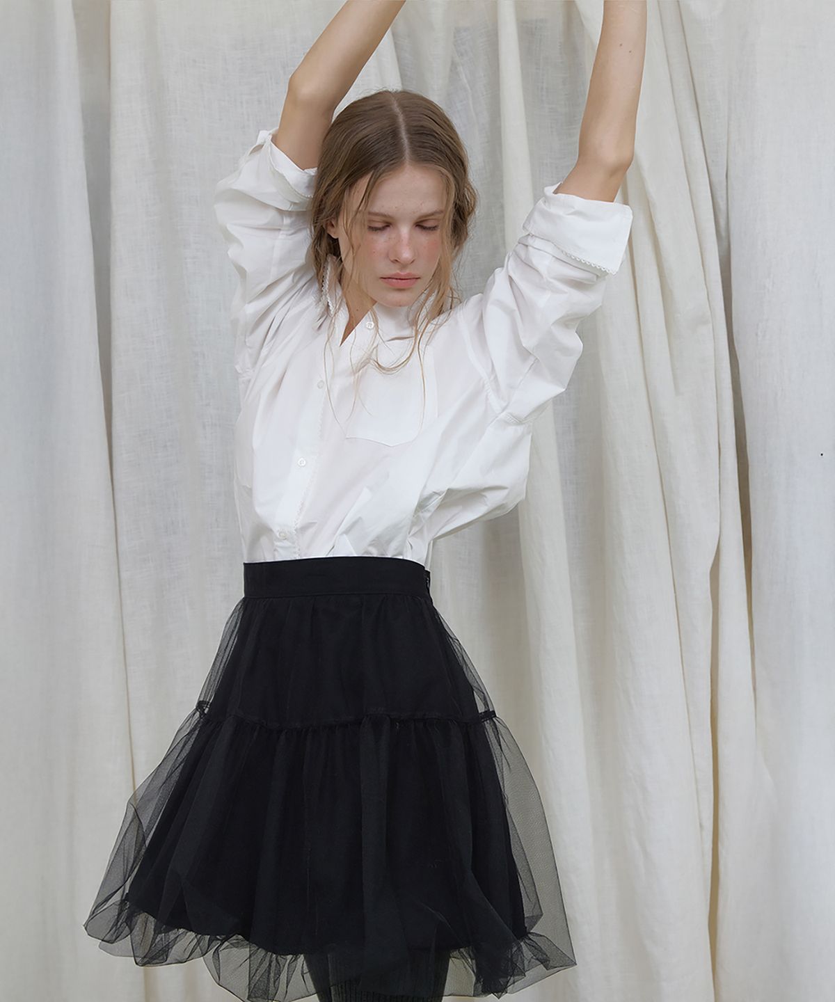 론크(LONQUE) BALLOON BANDING MESH LAYERED MINI SKIRT (BLACK)