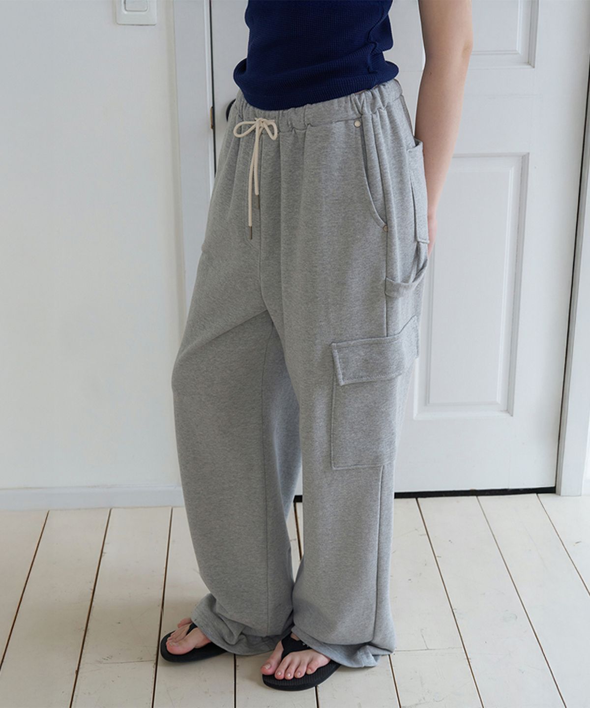썸웨어버터(SOMEWHEREBUTTER) Tomp Cargo Sweat Pants - Grey